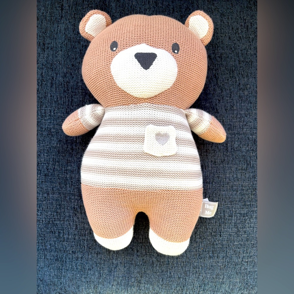 Knit bear. Rattles when shaken